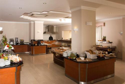 20 фото отеля Astir Beach 4* 