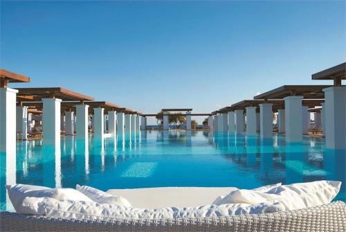 4 фото отеля Grecotel Amirandes 5* 