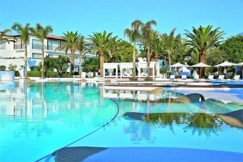 1 фото отеля Grecotel Caramel Boutique Resort 5* 