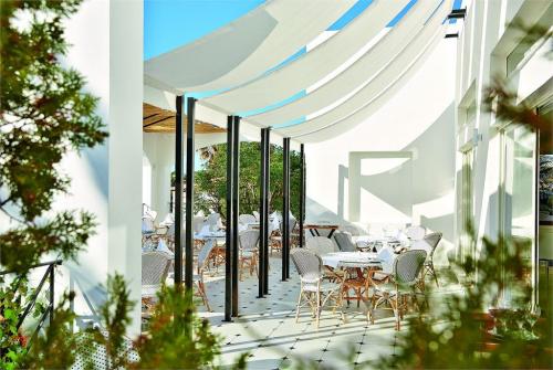 20 фото отеля Grecotel Caramel Boutique Resort 5* 