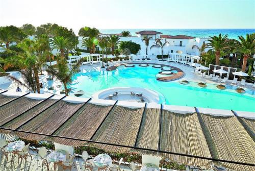 22 фото отеля Grecotel Caramel Boutique Resort 5* 