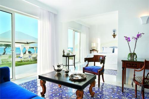 28 фото отеля Grecotel Caramel Boutique Resort 5* 