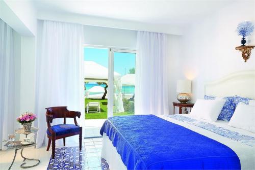 29 фото отеля Grecotel Caramel Boutique Resort 5* 