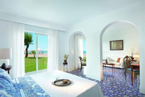 31 фото отеля Grecotel Caramel Boutique Resort 5* 