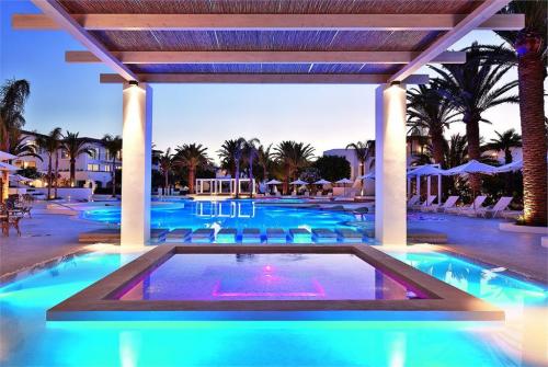 40 фото отеля Grecotel Caramel Boutique Resort 5* 