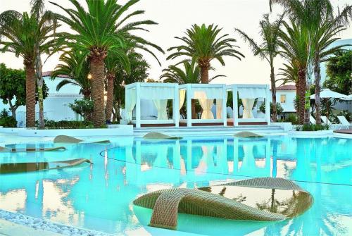 5 фото отеля Grecotel Caramel Boutique Resort 5* 