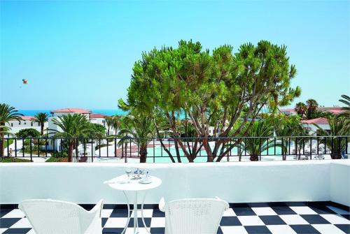 6 фото отеля Grecotel Caramel Boutique Resort 5* 