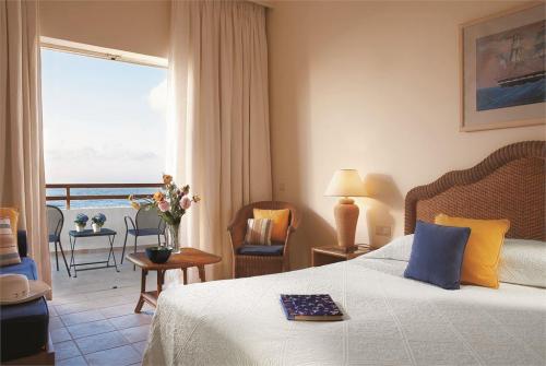 18 фото отеля Grecotel Marine Palace Suites 4* 