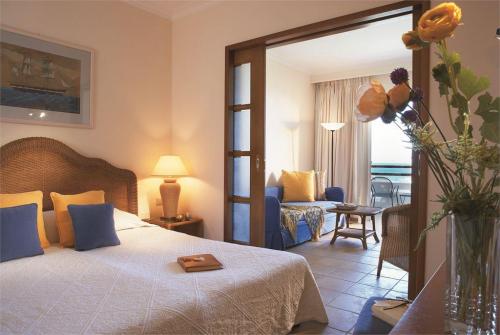 19 фото отеля Grecotel Marine Palace Suites 4* 