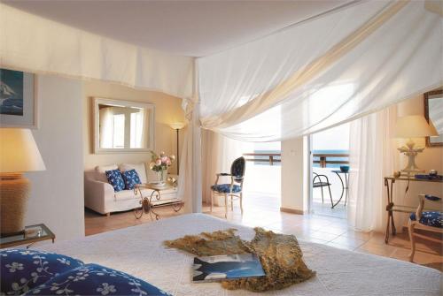 23 фото отеля Grecotel Marine Palace Suites 4* 