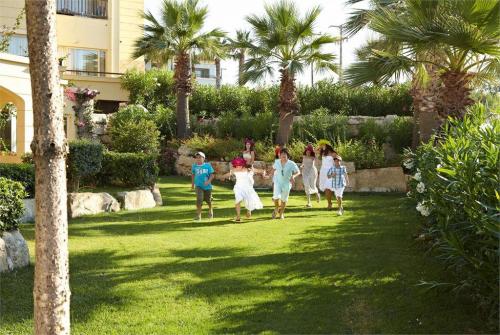 54 фото отеля Grecotel Marine Palace Suites 4* 