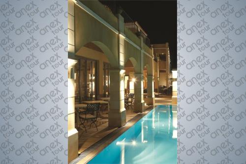 7 фото отеля Grecotel Plaza Spa Apartments 4* 