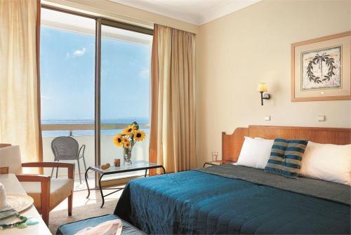 18 фото отеля Grecotel Rhodos Royal 4* 