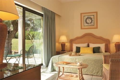 21 фото отеля Grecotel Rhodos Royal 4* 